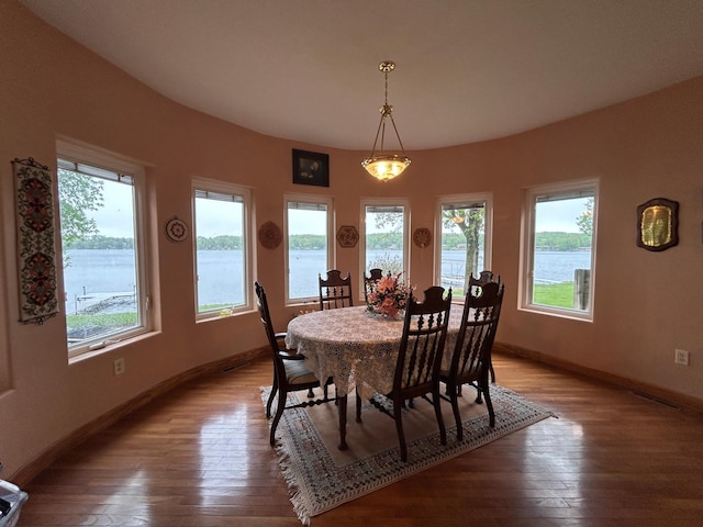 14620 Thomas Rd, Lake Park, MN 56554 - dining area featuring light wood-style flooring, healthy amount of natural light, baseboards, and a water view