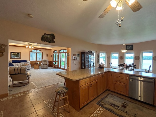 14620 Thomas Rd, Lake Park, MN 56554 - kitchen featuring dishwasher, ceiling fan, tile patterned floors, open floor plan, and healthy amount of natural light