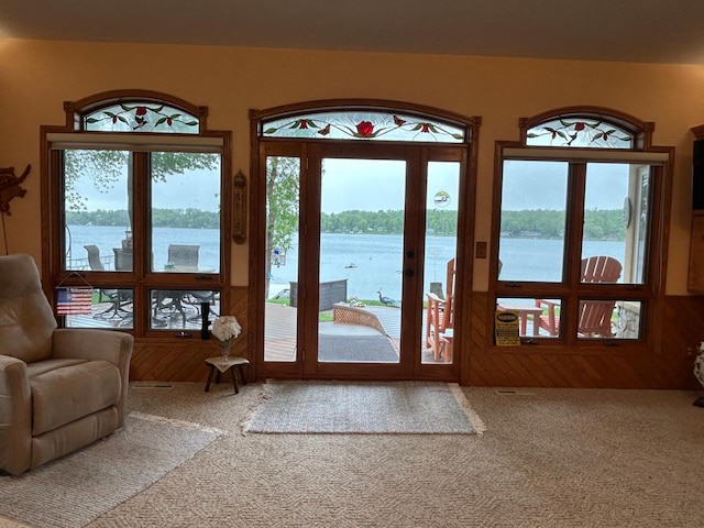 14620 Thomas Rd, Lake Park, MN 56554 - doorway to outside featuring carpet, a water view, and plenty of natural light