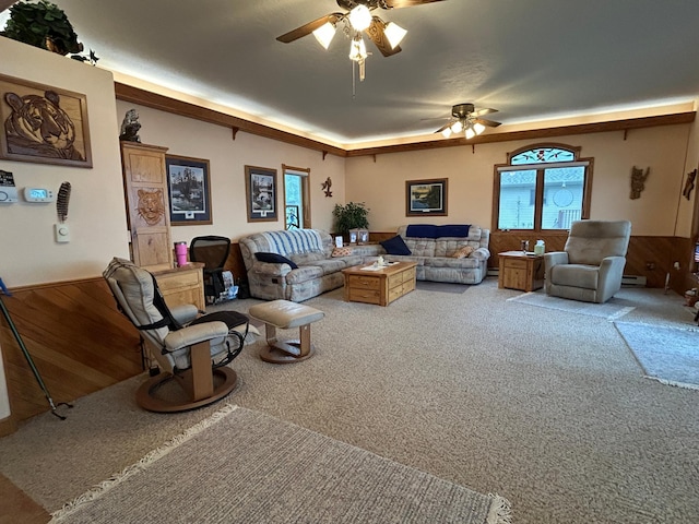 14620 Thomas Rd, Lake Park, MN 56554 - carpeted living area featuring ceiling fan, wood walls, and a wainscoted wall