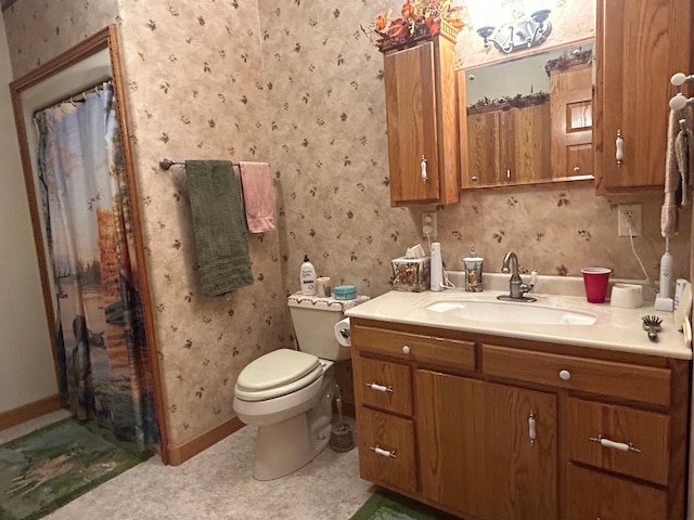 14620 Thomas Rd, Lake Park, MN 56554 - full bathroom featuring toilet, wallpapered walls, vanity, a shower with curtain, and baseboards