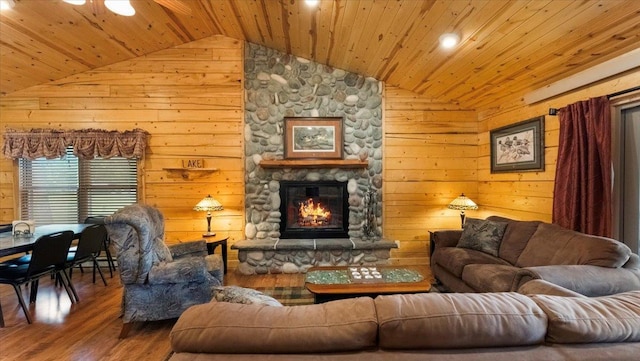 9231 Shady Haven Dr NW, Alexandria, MN 56308 - living area featuring lofted ceiling, wood ceiling, wood finished floors, a fireplace, and wooden walls