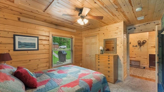9231 Shady Haven Dr NW, Alexandria, MN 56308 - bedroom with wooden walls, wooden ceiling, and ceiling fan