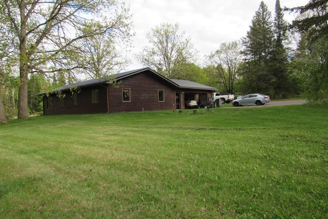 4054 Aspen Rd, Moose Lake, MN 55767 - view of side of property with a yard