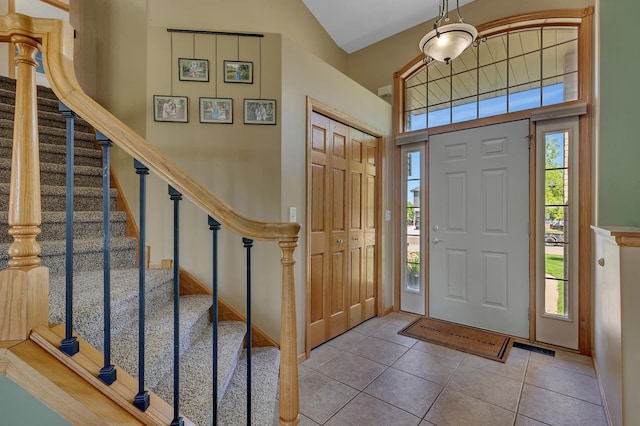 23807 Brendan Way, Rogers, MN 55374 - entrance foyer with plenty of natural light, tile patterned floors, and stairway