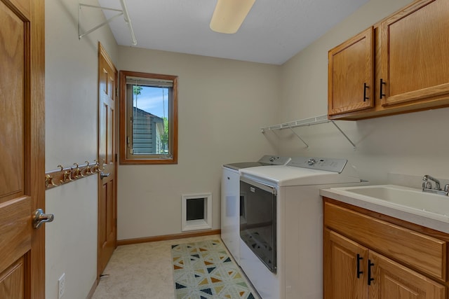 23807 Brendan Way, Rogers, MN 55374 - clothes washing area with washing machine and dryer, cabinet space, and baseboards