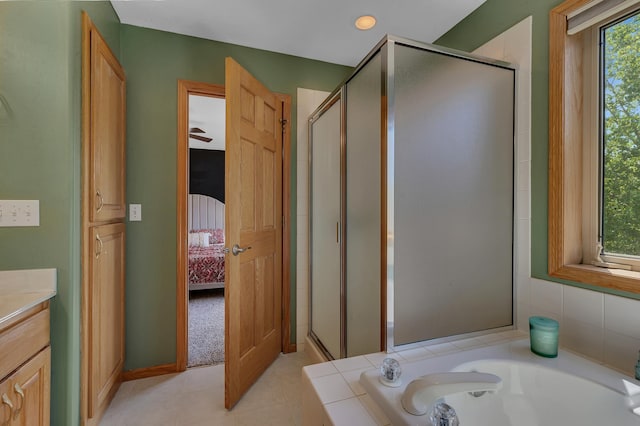 23807 Brendan Way, Rogers, MN 55374 - full bath featuring connected bathroom, a stall shower, a garden tub, and vanity