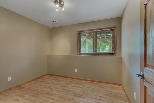 23807 Brendan Way, Rogers, MN 55374 - unfurnished room featuring light wood-style flooring and baseboards