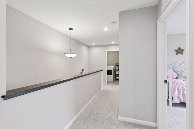 1049 Fabel Ln, Waconia, MN 55387 - hallway with an upstairs landing, carpet floors, baseboards, and recessed lighting
