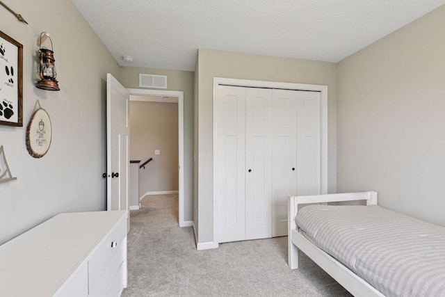 1049 Fabel Ln, Waconia, MN 55387 - bedroom with light carpet, a closet, and baseboards