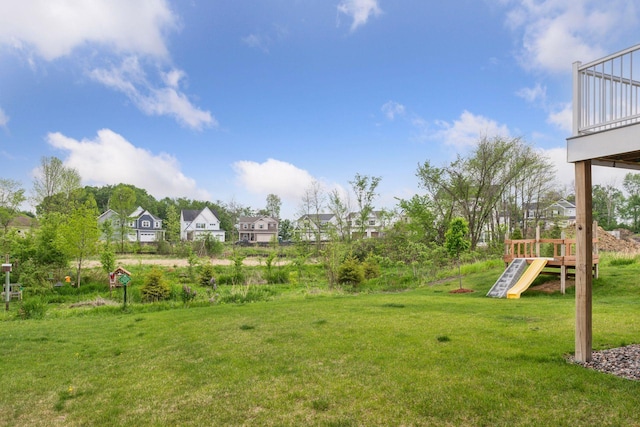 1049 Fabel Ln, Waconia, MN 55387 - view of green lawn featuring a residential view and a playground