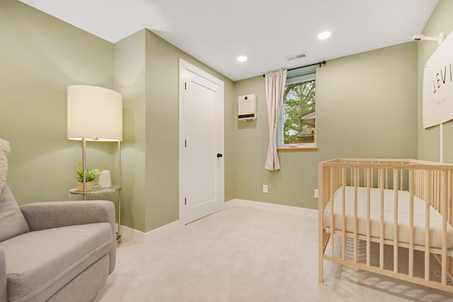 2400 Oakwood Dr, Burnsville, MN 55306 - carpeted bedroom featuring baseboards, recessed lighting, and a crib
