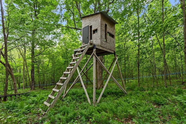 W1618 850th Ave, Spring Valley, WI 54767 - view of jungle gym featuring a wooded view