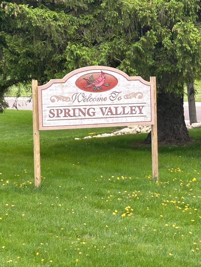 W1618 850th Ave, Spring Valley, WI 54767 - community / neighborhood sign featuring a yard