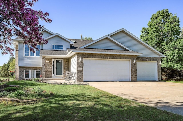 3062 196th Ave NE, East Bethel, MN 55011 - view of front of house with driveway, brick siding, an attached garage, roof with shingles, and a front lawn