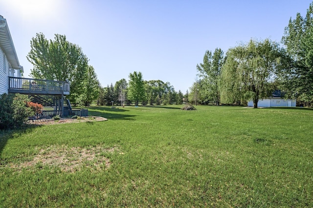 3062 196th Ave NE, East Bethel, MN 55011 - view of grassy yard featuring a deck