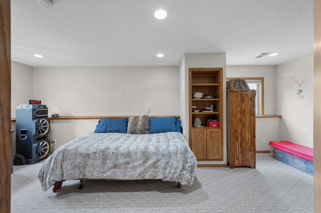 3062 196th Ave NE, East Bethel, MN 55011 - carpeted bedroom with a textured ceiling and recessed lighting