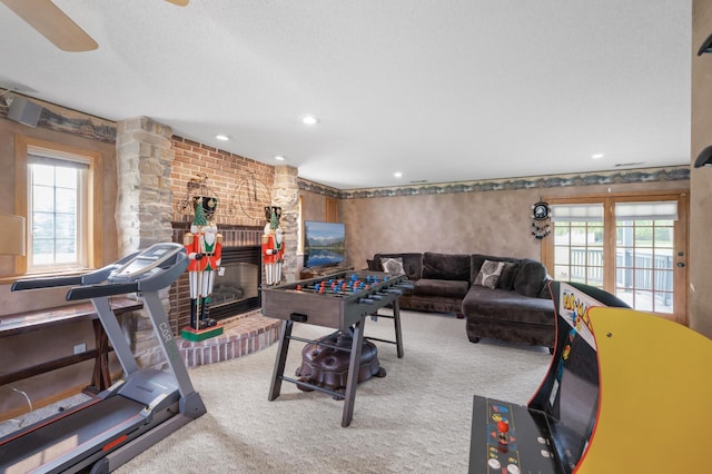 3062 196th Ave NE, East Bethel, MN 55011 - game room featuring a fireplace, plenty of natural light, carpet floors, and recessed lighting