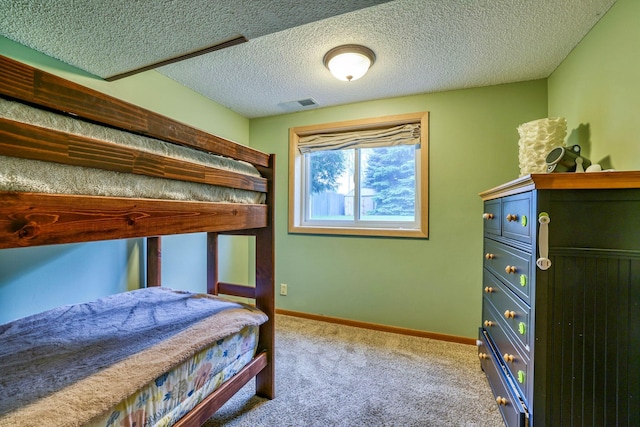 11215 Sumter Ave N, Champlin, MN 55316 - carpeted bedroom featuring baseboards and a textured ceiling