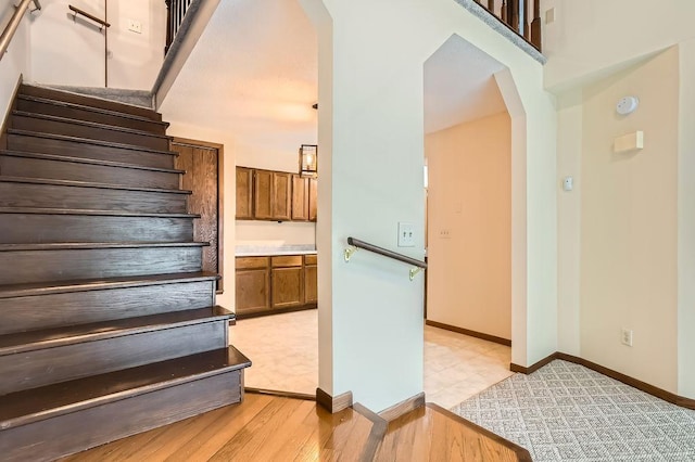 544 Auburn Pl NW Unit C, Elk River, MN 55330 - stairs with arched walkways and baseboards
