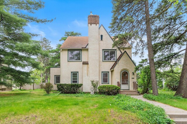2708 Chowen Ave S, Minneapolis, MN 55416 - tudor house featuring stucco siding and a chimney