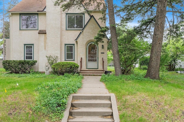 2708 Chowen Ave S, Minneapolis, MN 55416 - view of front facade featuring stucco siding and entry steps