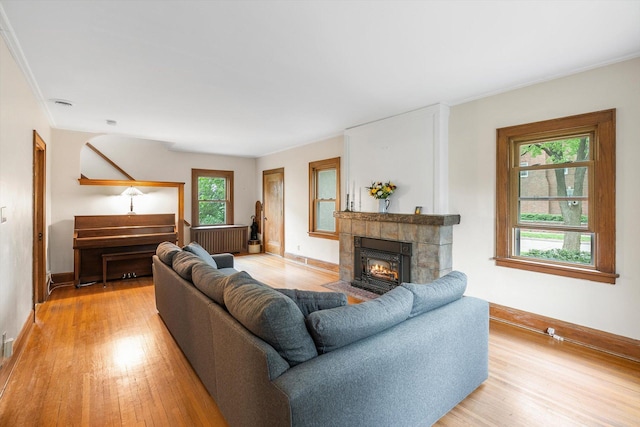 2708 Chowen Ave S, Minneapolis, MN 55416 - living area featuring light wood finished floors, baseboards, and ornamental molding