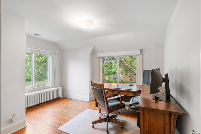 2708 Chowen Ave S, Minneapolis, MN 55416 - home office featuring radiator, light wood-type flooring, and baseboards