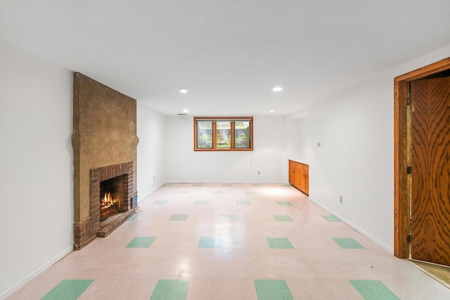 2708 Chowen Ave S, Minneapolis, MN 55416 - unfurnished living room with a fireplace, light flooring, recessed lighting, and baseboards