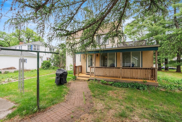 2708 Chowen Ave S, Minneapolis, MN 55416 - view of front facade featuring a front lawn, stucco siding, and a porch