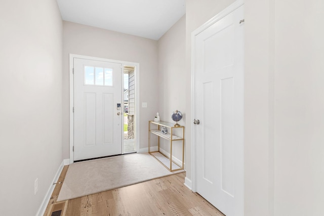 14520 109th Ave N, Maple Grove, MN 55369 - entryway featuring light wood finished floors and baseboards
