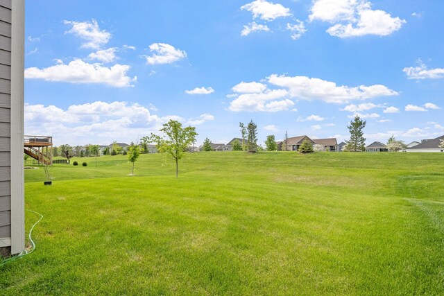 14520 109th Ave N, Maple Grove, MN 55369 - view of grassy yard featuring a residential view