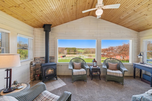 2929 170th St, Frederic, WI 54837 - sunroom featuring vaulted ceiling and a wood stove