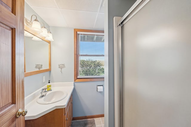 2929 170th St, Frederic, WI 54837 - full bathroom featuring vanity, tile patterned flooring, an enclosed shower, and baseboards