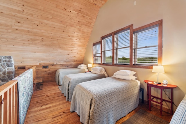 2929 170th St, Frederic, WI 54837 - bedroom featuring wood finished floors, lofted ceiling, wooden ceiling, and wooden walls