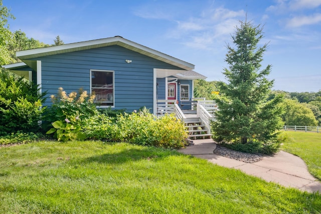 2929 170th St, Frederic, WI 54837 - view of front of house with a deck and stairway