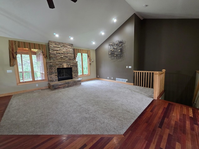 7390 360th St, North Branch, MN 55056 - unfurnished living room featuring a ceiling fan, a fireplace, baseboards, dark wood-style floors, and recessed lighting