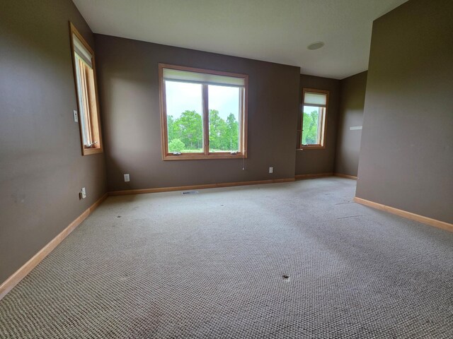 7390 360th St, North Branch, MN 55056 - unfurnished room with baseboards and light carpet