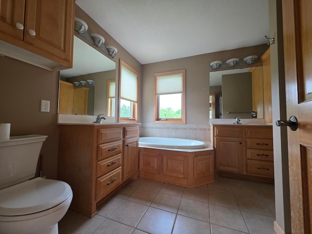 7390 360th St, North Branch, MN 55056 - full bath featuring toilet, a garden tub, tile patterned flooring, and two vanities