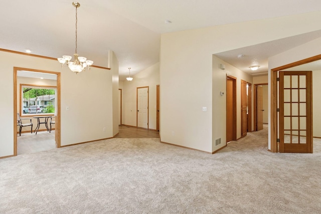 934 105th Ave NW, Coon Rapids, MN 55433 - carpeted spare room with a chandelier and baseboards