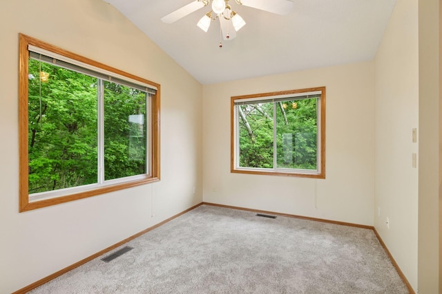 934 105th Ave NW, Coon Rapids, MN 55433 - empty room with carpet, lofted ceiling, baseboards, and a ceiling fan