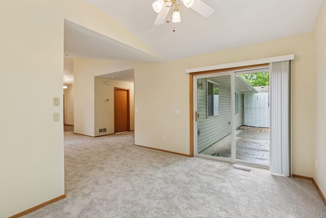 934 105th Ave NW, Coon Rapids, MN 55433 - unfurnished room featuring light colored carpet, vaulted ceiling, baseboards, and ceiling fan