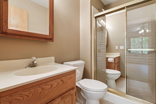 934 105th Ave NW, Coon Rapids, MN 55433 - full bathroom with toilet, vanity, and a stall shower