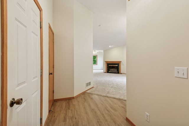 934 105th Ave NW, Coon Rapids, MN 55433 - corridor with light wood-style flooring and baseboards