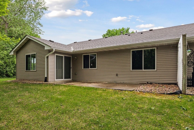 934 105th Ave NW, Coon Rapids, MN 55433 - rear view of property with a patio, a yard, and roof with shingles