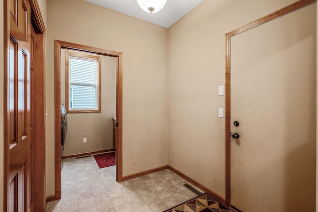 10025 Toledo Dr N, Brooklyn Park, MN 55443 - foyer entrance with baseboards and light floors