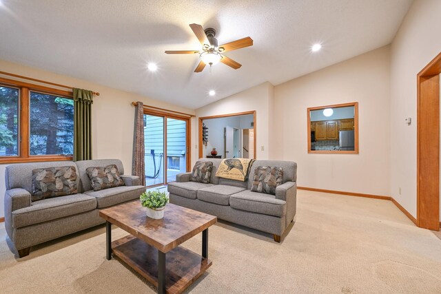 3760 Trenton Ln N, Plymouth, MN 55441 - living area featuring lofted ceiling, light colored carpet, a ceiling fan, and recessed lighting