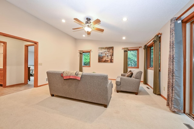 3760 Trenton Ln N, Plymouth, MN 55441 - living area with light colored carpet, ceiling fan, plenty of natural light, recessed lighting, and lofted ceiling
