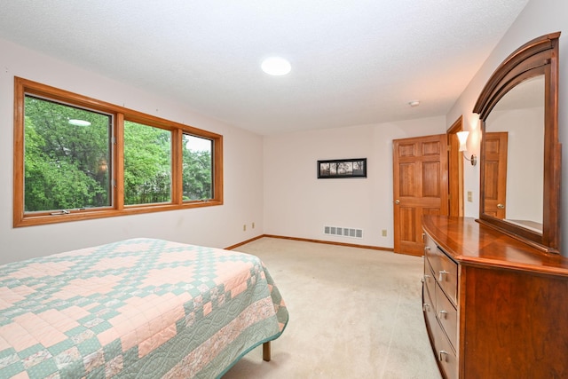 3760 Trenton Ln N, Plymouth, MN 55441 - bedroom featuring light colored carpet and baseboards