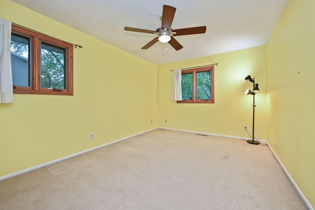 3760 Trenton Ln N, Plymouth, MN 55441 - spare room with light colored carpet and ceiling fan